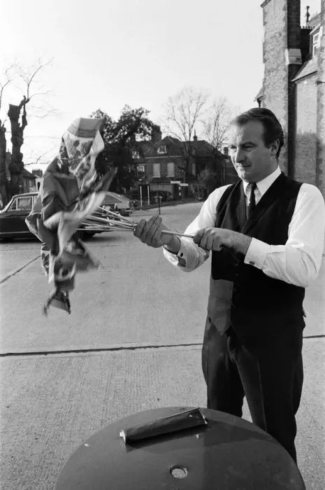 Framed Print : The Brolley Challenger - Jim Carver, of Orpington, taking an umbrella out of a case Framed Print : The Brolley Challenger - Jim Carver, of Orpington, taking an umbrella out of a case