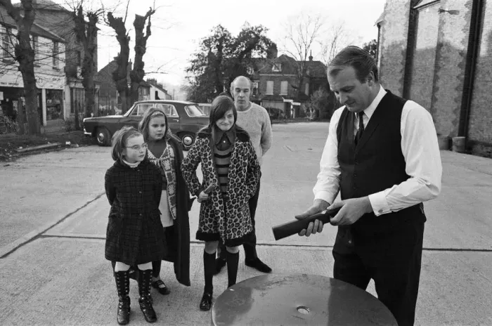 Framed Print : The Brolley Challenger - Jim Carver, of Orpington, taking an umbrella out of a case Framed Print : The Brolley Challenger - Jim Carver, of Orpington, taking an umbrella out of a case