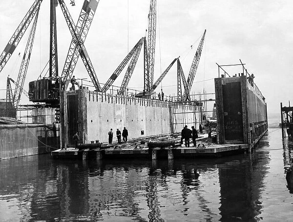 Bromborough, Wirral, Merseyside. A reinforced concrete dry dock launched at Bromborough
