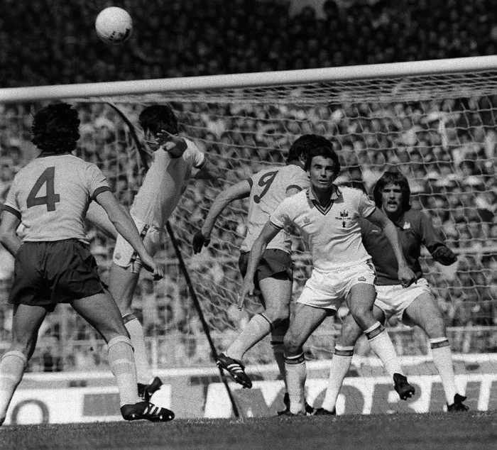Framed Print : Brooking in defence as Arsenal launch an attack during the West Ham v Arsenal Cup Final Framed Print : Brooking in defence as Arsenal launch an attack during the West Ham v Arsenal Cup Final