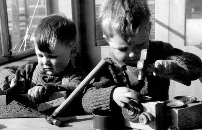 Framed Print : Two brothers Colin and Keith Wympress on the carpenters bench. 28th March 1951