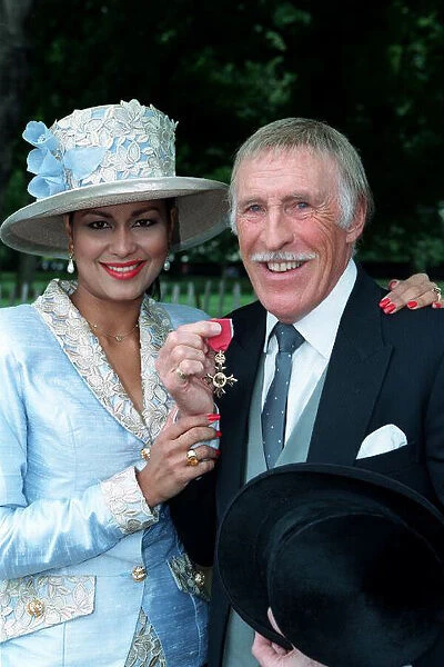 Bruce Forsyth Comedian  /  TV Presenter, July 1998. With his wife Wilnelia after