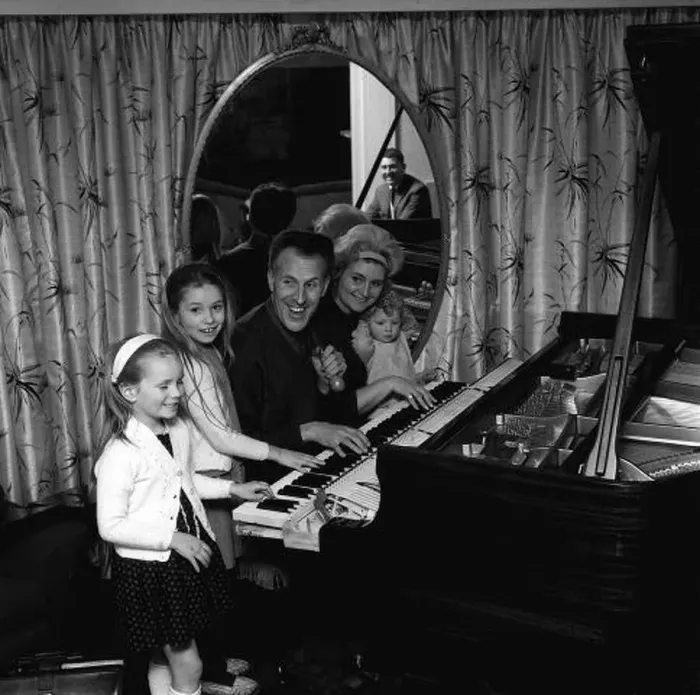 : Bruce Forsyth with Family 1964 Comedian with wife and children playing at piano : Bruce Forsyth with Family 1964 Comedian with wife and children playing at piano