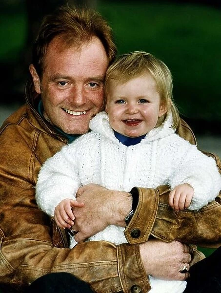 Bruce Jones milkman and actor the star of Raining Stones with his granddaughter Sophie