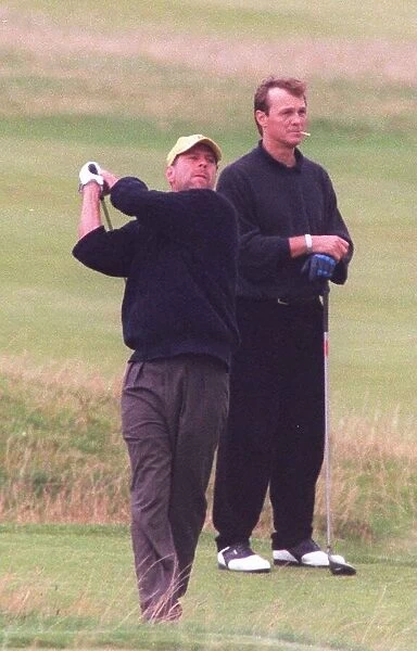 Bruce Willis playing golf at Prestwick. August 1998