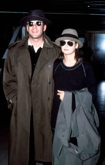 Framed Print : Bruce Willis with his wife Demi Moore pictured arriving at London Heathrow Airport Framed Print : Bruce Willis with his wife Demi Moore pictured arriving at London Heathrow Airport