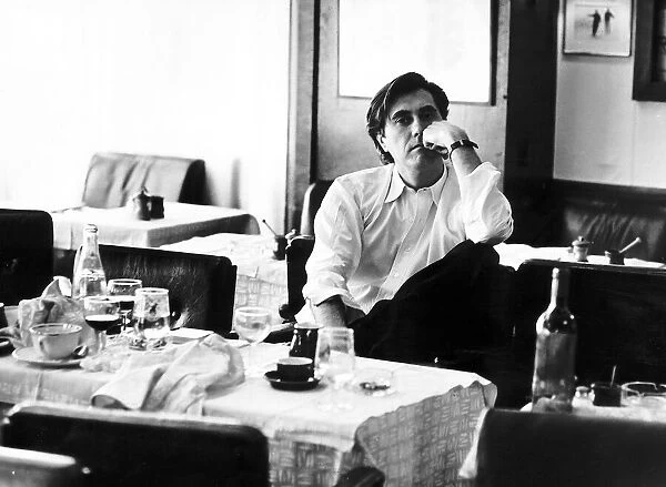 Bryan Ferry Singer sitting in empty restaurant in Paris where he is recording a new album