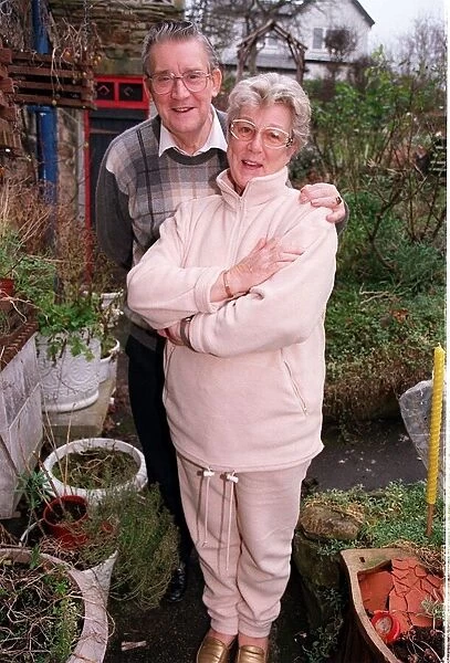 Bryan Mosley actor December 1998 dancing with wife Norma in their garden