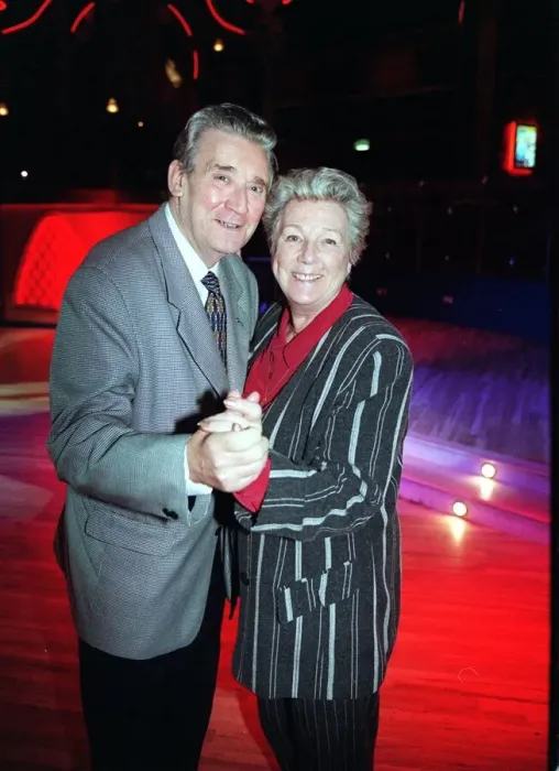 Framed Print : Bryan Mosley actor December 1998 dancing with wife Norma at a Christmas Party