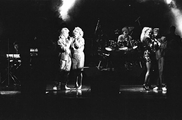 Bucks Fizz seen here performing on stage at Leas Cliff Hall, Folkestone. 15th April 1989