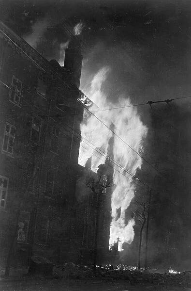 A building in Grays Inn Road, London on fore after a night of bombing in the blitz during