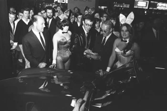 Framed Print : Bunny girls and Peter Seller seen here at the British International Motor Show in London Framed Print : Bunny girls and Peter Seller seen here at the British International Motor Show in London