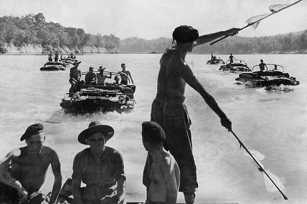 Burma DUKWs (known as Ducks) take supplies and reinforcements from the Chindwin River to