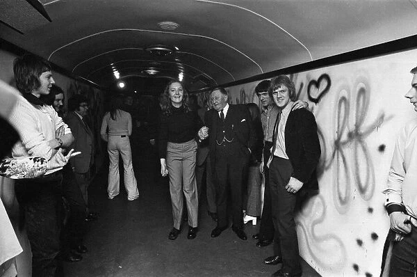 Burnley fans aboard the disco train to London. Chairman Bob Lord is pictured with fans