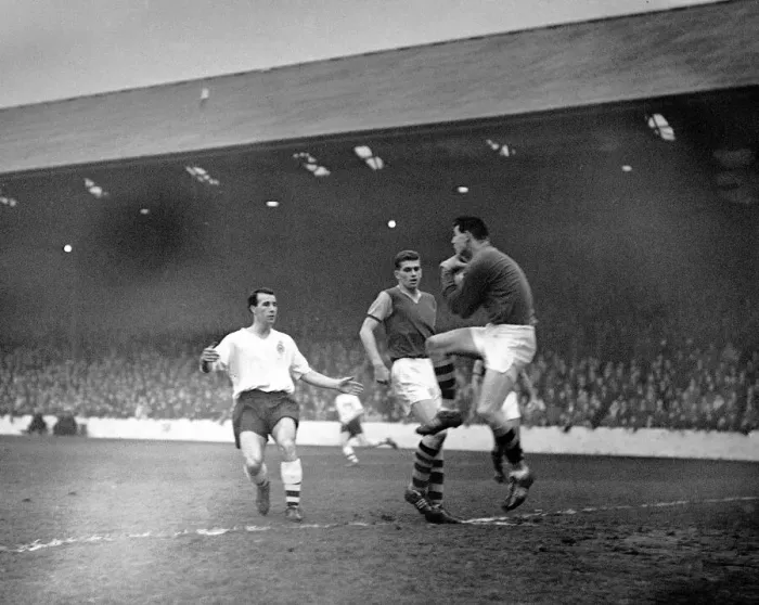 Framed Print : Burnley v Bolton 16th December 1959 Burbley goal keeper Adam Blacklaw heaves a Framed Print : Burnley v Bolton 16th December 1959 Burbley goal keeper Adam Blacklaw heaves a