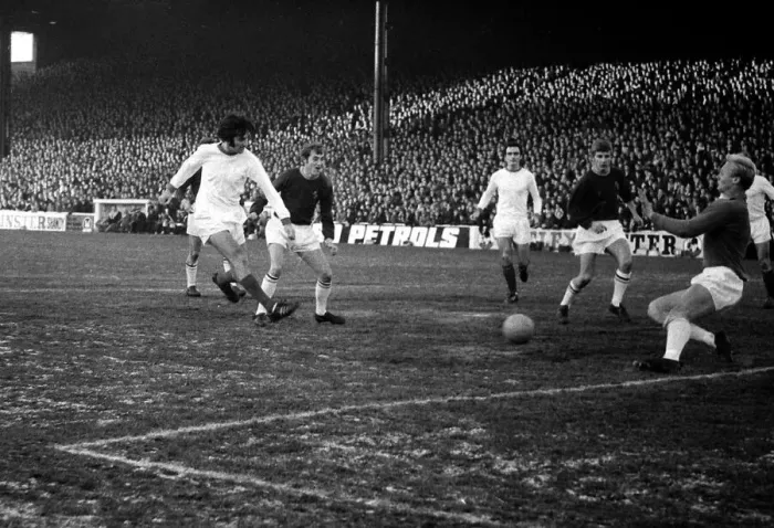 Framed Print : Burnley v Manchester United-George Best shoots at goal but it is pushed wide for a