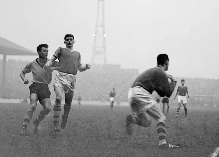 Framed Print : Burnley v Wolves 7th November 1959 Murray the Wolves centre forward dashes in with