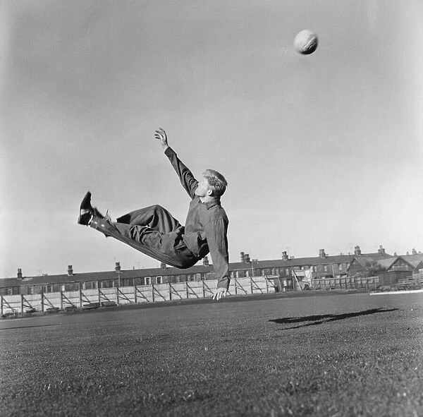 Burnleys Ray Pointer attempts an over head kick during training 14  /  02  /  1962