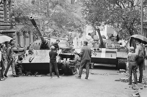 The burnt out wreckage of a Russian T54 tank seen here in central Prague following