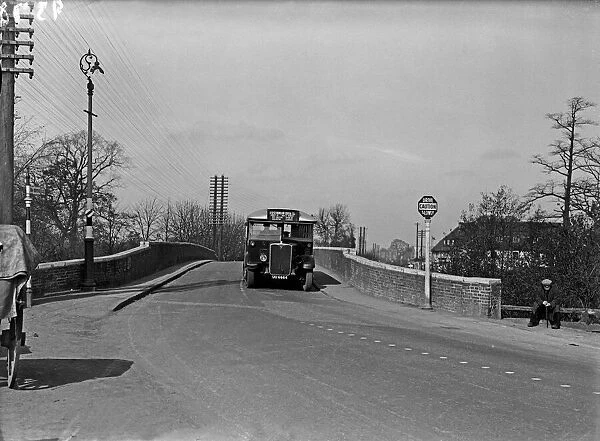 Bus approaching, High Bridge, near the Swan and Bottle, Uxbridge 22 March 1935
