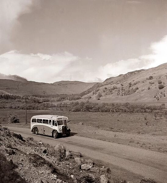 A bus journey in the highlands of Scotland circa 1950s transport road rural