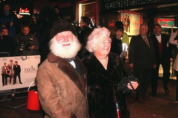Buster Merryfield actor with wife attend the film premiere of Fierce Creatures in London