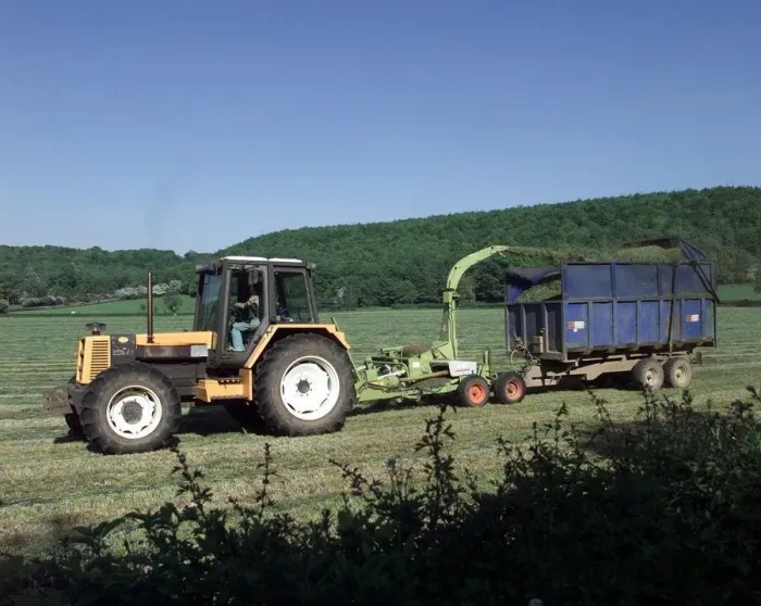 Framed Print : Busy in the fields near Alcester a tractor cutting its crop in the sunshine. 1998 Framed Print : Busy in the fields near Alcester a tractor cutting its crop in the sunshine. 1998