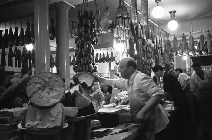 Framed Print : A busy Italian delicatessen shop, Parma, Italy Circa 1955 Framed Print : A busy Italian delicatessen shop, Parma, Italy Circa 1955