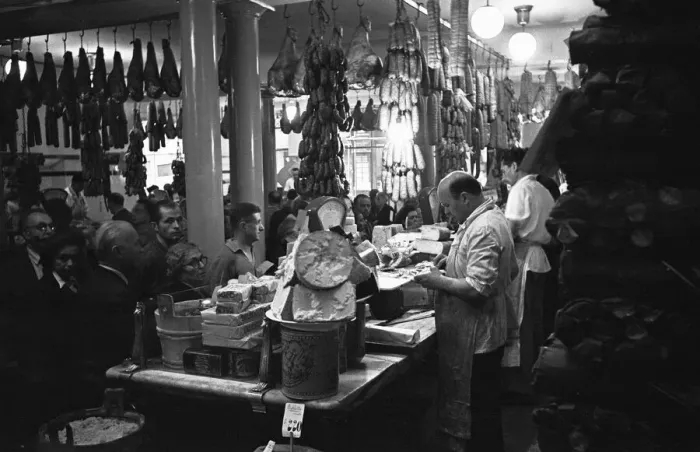 Framed Print : A busy Italian delicatessen shop, Parma, Italy Circa 1955 Framed Print : A busy Italian delicatessen shop, Parma, Italy Circa 1955
