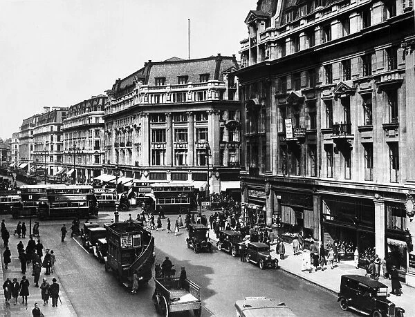 Busy scene in Central London showing the traffic at Regent Street and Oxford Street