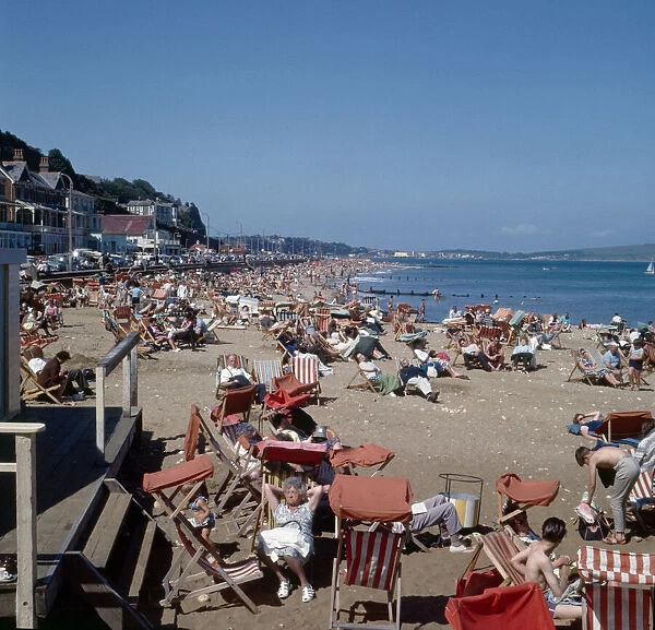 Busy scenes on the beach in the town of Shanklin on the Isle of Wight, July 1965