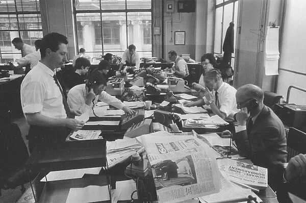 Busy scenes on the Daily Herald news desk, 1964