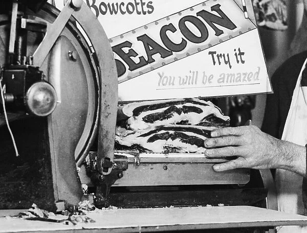 Butcher cutting off Meat during the second World War II where food was rationed