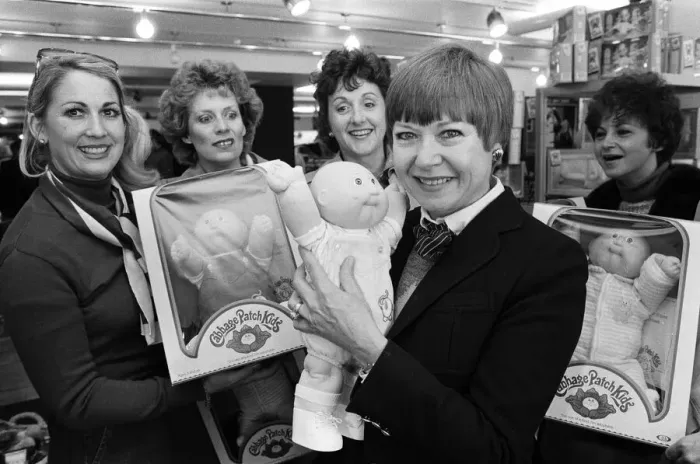 Framed Print : Cabbage Patch Dolls for sale in Harrods. Barbara Ericson from Dallas along with some