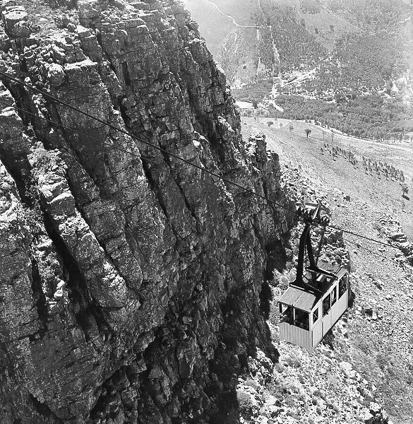 The cable car carrying tourist to the summit of Table Mountain which over looks Cape Town