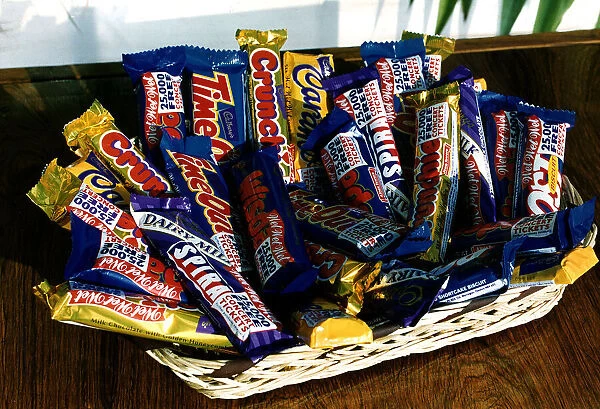 Cadbury Chocolate bars on table in wicker basket