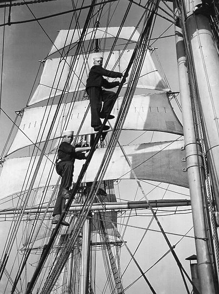 Cadets climbing the main mast of the sailing ship Sorlandet seen here in the English