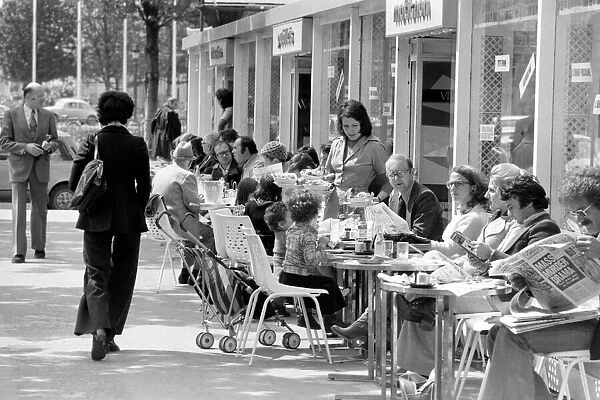 The Cafe life of Paris on Sunday afternoon at the Champs Elysees