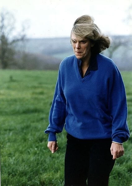 Camilla Parker Bowles strolling in the grounds of her Wiltshire home this morning friend