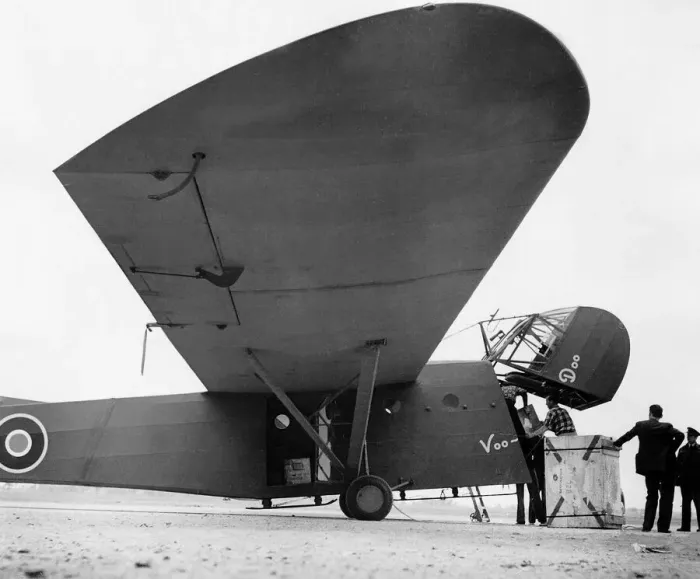 Framed Print : A Canadian Air Force CG4a supply glider is loaded before being towed across