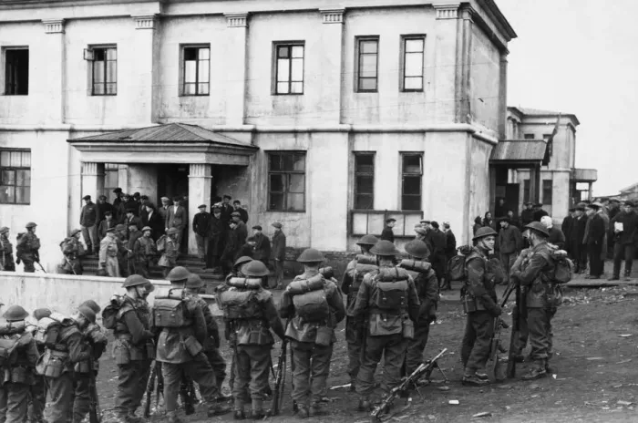 Framed Print : Canadian guard hear a mission briefing outside a communal building in Barentsburg Framed Print : Canadian guard hear a mission briefing outside a communal building in Barentsburg