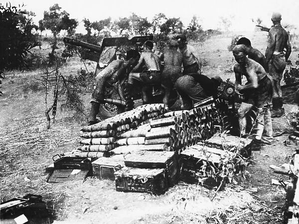 Canadian gunners of the Western Canada Field Battery, working from a good stock of shells