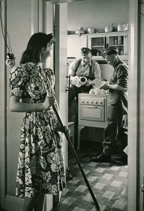 Framed Print : Canadian soldiers washing-up while english woman sweeps floor Framed Print : Canadian soldiers washing-up while english woman sweeps floor