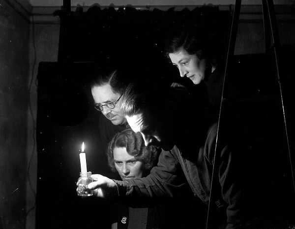 Candlelight in the air raid shelter. September 1940