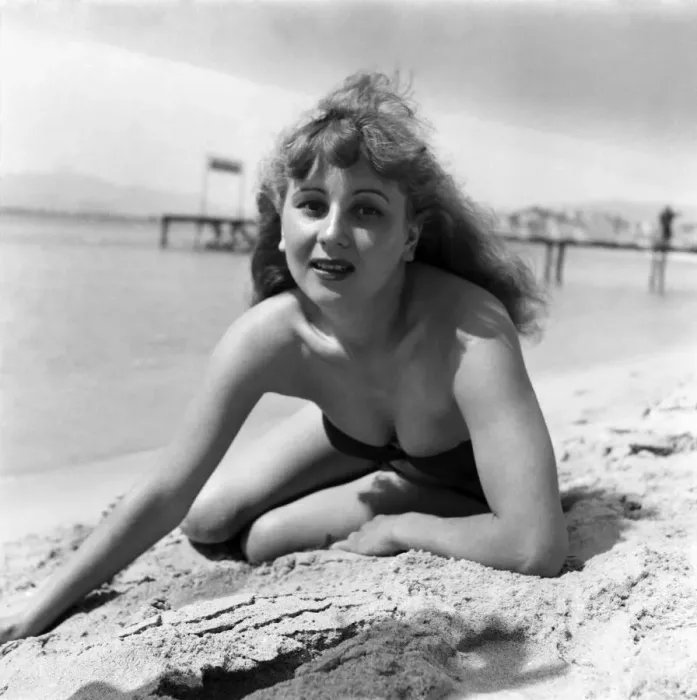 Framed Print : Cannas Film Festival. Holiday Maker Simone Gervais seen here on the beach at Cannes