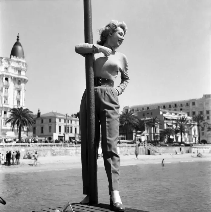 Framed Print : Cannes Film Festival 1953. France Roche seen here on the sea front at Cannes. D3118 Framed Print : Cannes Film Festival 1953. France Roche seen here on the sea front at Cannes. D3118