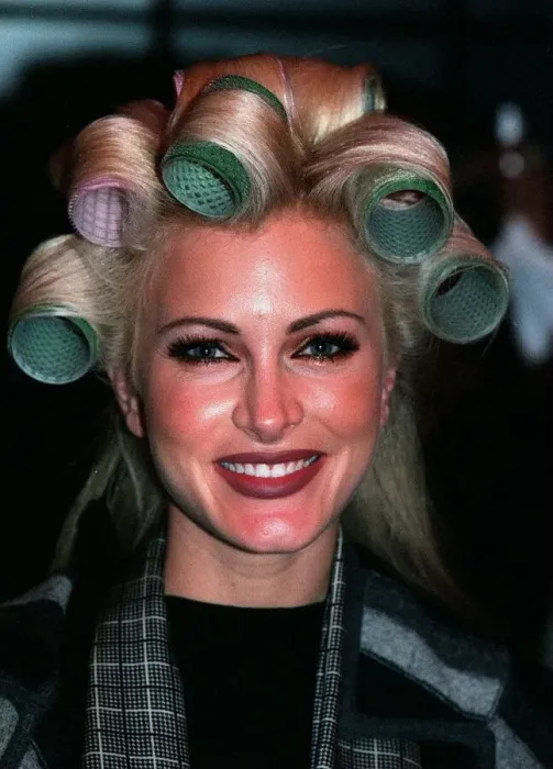 Framed Print : Caprice having her hair and make up done at the Littlewoods Fashion Show With rollers in