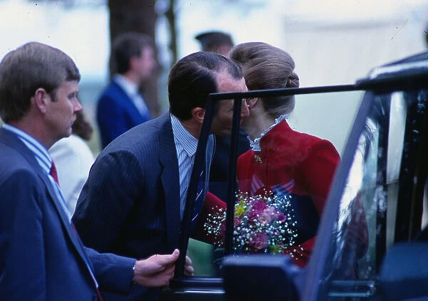 Captain Mark Phillips June 1988 giving Princess Anne a kiss on cheek at car door