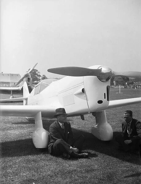 Captain Percival seen her with his Mew Gull aircraft at the 1935 Hendon Air Display 29th