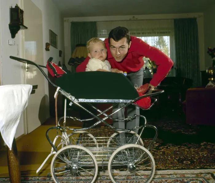 Framed Print : Captain of the West Germany football team Franz Beckenbauer pictured at home with his son